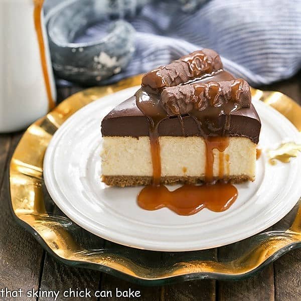 Twix Cheesecake slice drizzled with caramel.