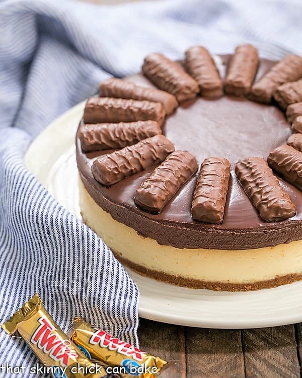 Twix Cheesecake on serving plate.