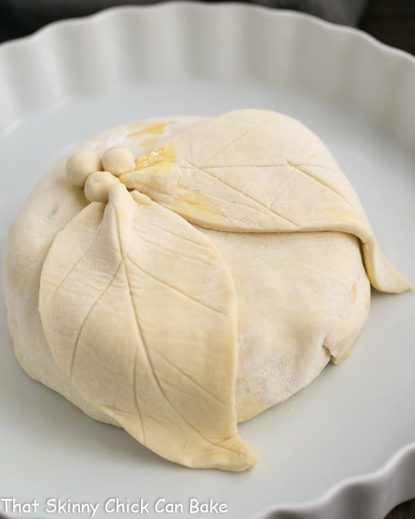 Cranberry Brie en Croute wrapped in puff pastry before baking.