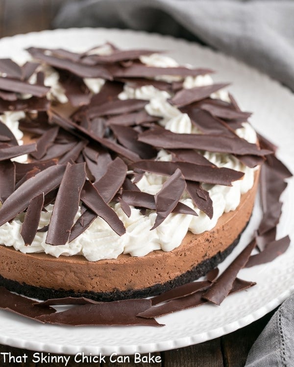 Easy Chocolate Mousse Cake on a white ceramic serving plate.