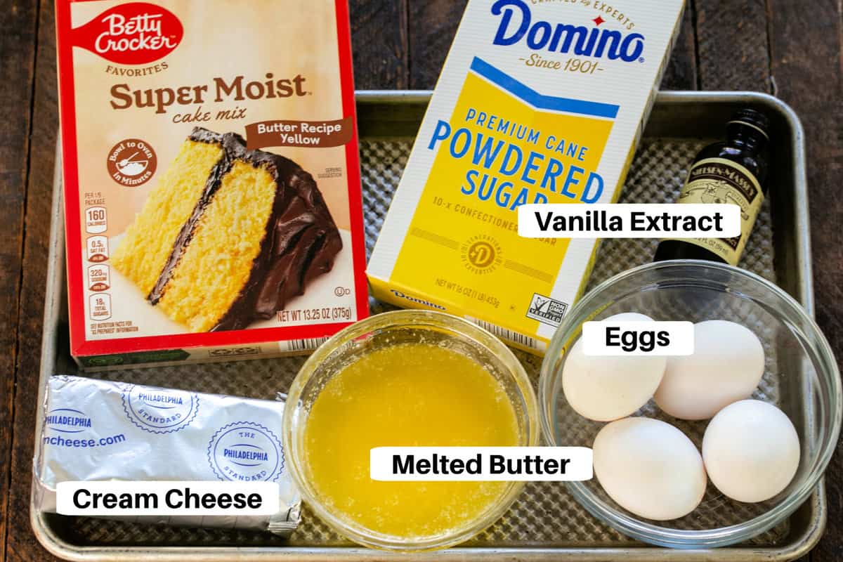 Easy Gooey Bars Ingredients with labels on a metal sheetpan.
