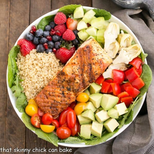 Overhead view of a Superfoods Salad in a white bowl.