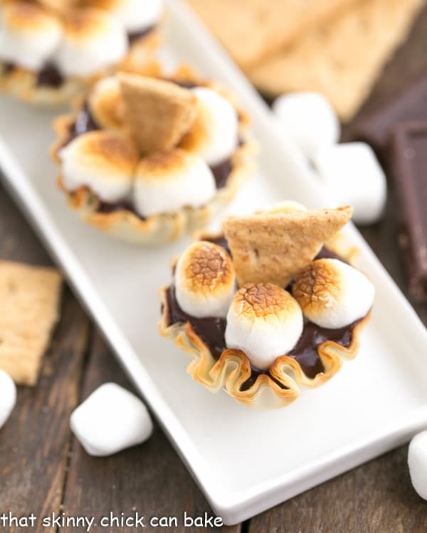 Mini S'mores Tarts on a white platter