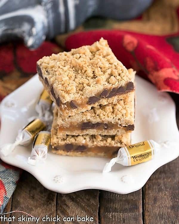 white dessert plate with a stack of 3 Oatmeal Caramel Bars