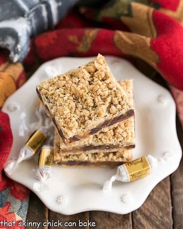 overhead image of Oatmeal Caramel Bars stacked onto a dessert plate