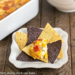 Fiesta Corn Dip | With a double dose of gooey cheese, you'll want to serve this magnificent dip at every gathering!