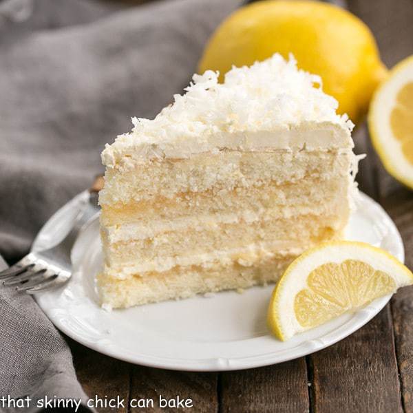 Lemon Layer Cake with Lemon Curd Filling and frosted with Lemon Swiss Meringue Buttercream!