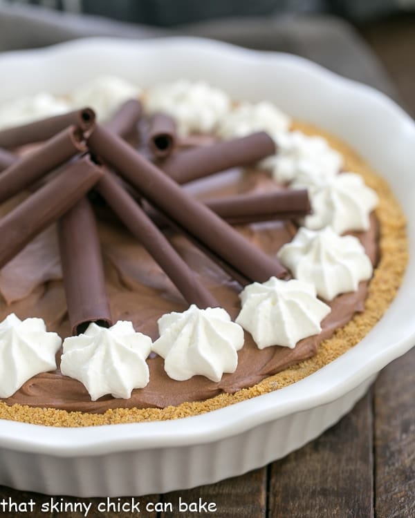 Chocolate Cream Pie in a white ceramic pie plate.