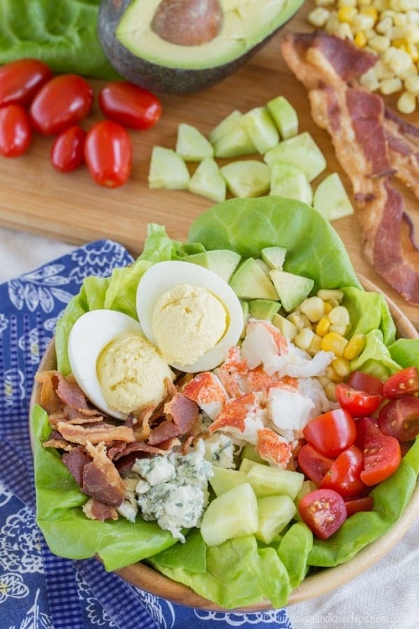 Lobster Cobb Salad overhead view in a wooden bowl