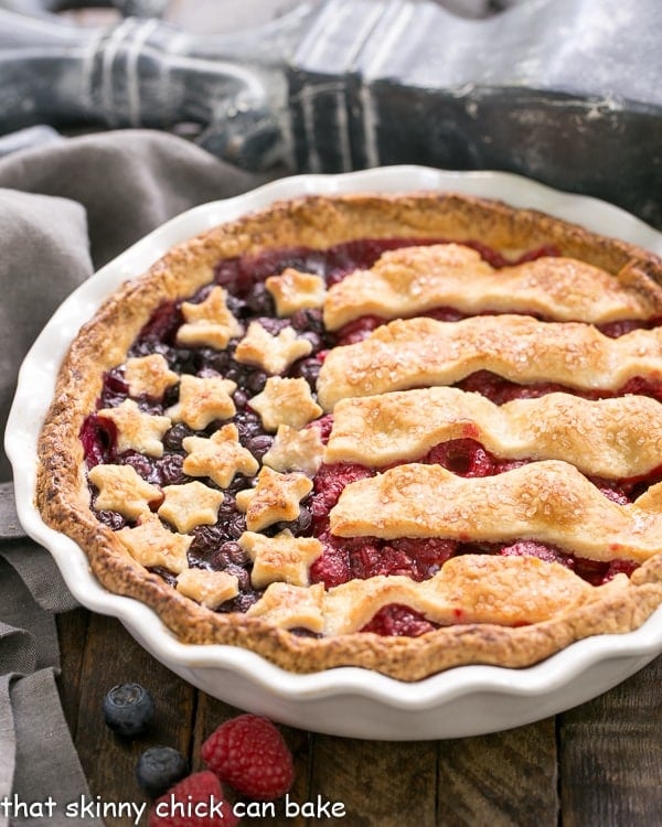 Double Berry Flag Pie in a white pie plate.