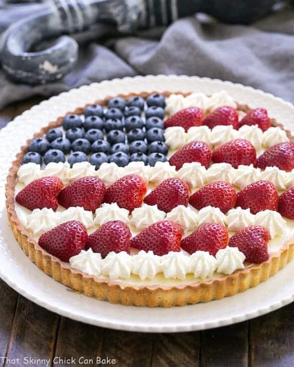 American Flag Fruit Tart on a white serving plate.