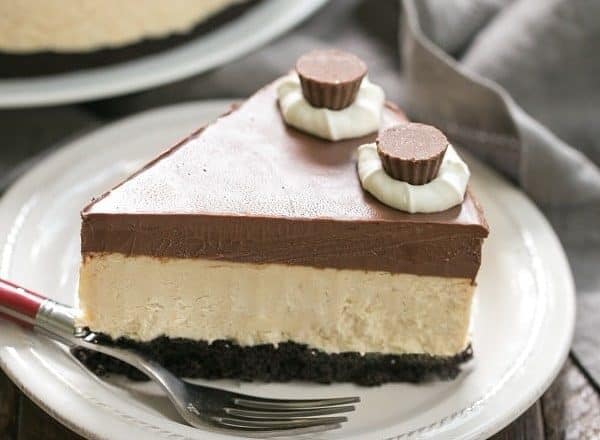 Chocolate Peanut Butter Pie | Chocolate cookie crust, peanut butter mousse and a thick layer of ganache make this one out of this world dessert!