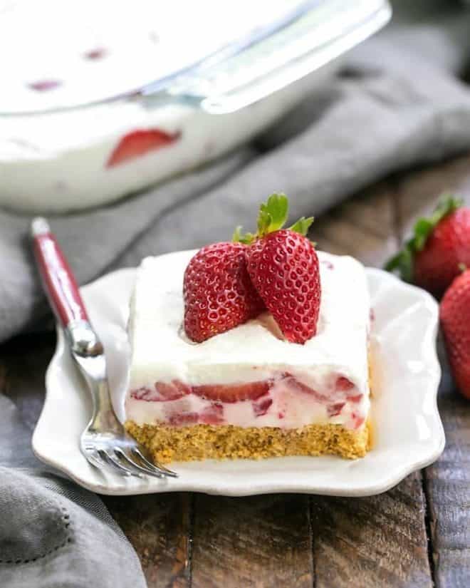 Strawberry Cheesecake Lush Dessert on a white dessert plate
