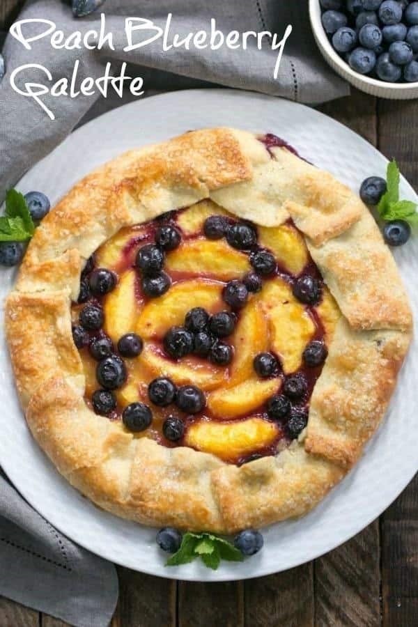 Peach Blueberry Galette - A gorgeous summer dessert with all the flavors of pie without all the work! #galette #peachtart #peaches #blueberries #summerdessert