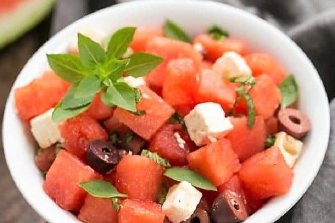 Watermelon Feta Basil Salad with Balsamic Vinaigrette in a white bowl