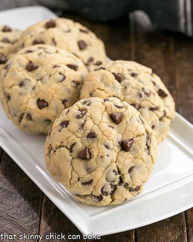 Levain Bakery Chocolate Chip Cookies on a whiite ceramic tray.