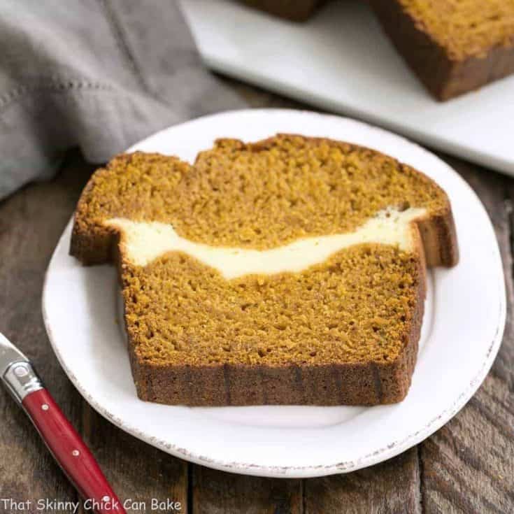 Cream Cheese Filled Pumpkin Bread A moist, delicious pumpkin loaf with a ribbon of cream cheese in the middle!