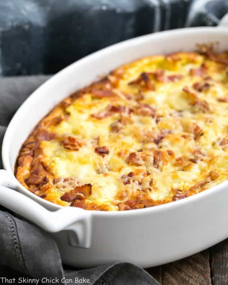 A close up of a cauliflower bacon gratin in a baking dish