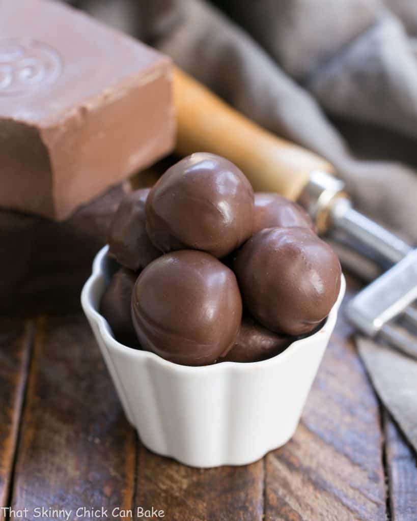 Chocolate Frangelico Truffles in a small white candy bowl