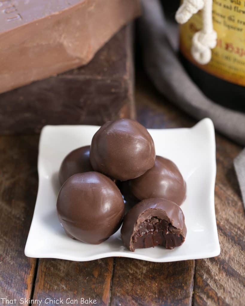 Chocolate Frangelico Truffles on a square white ceramic plate