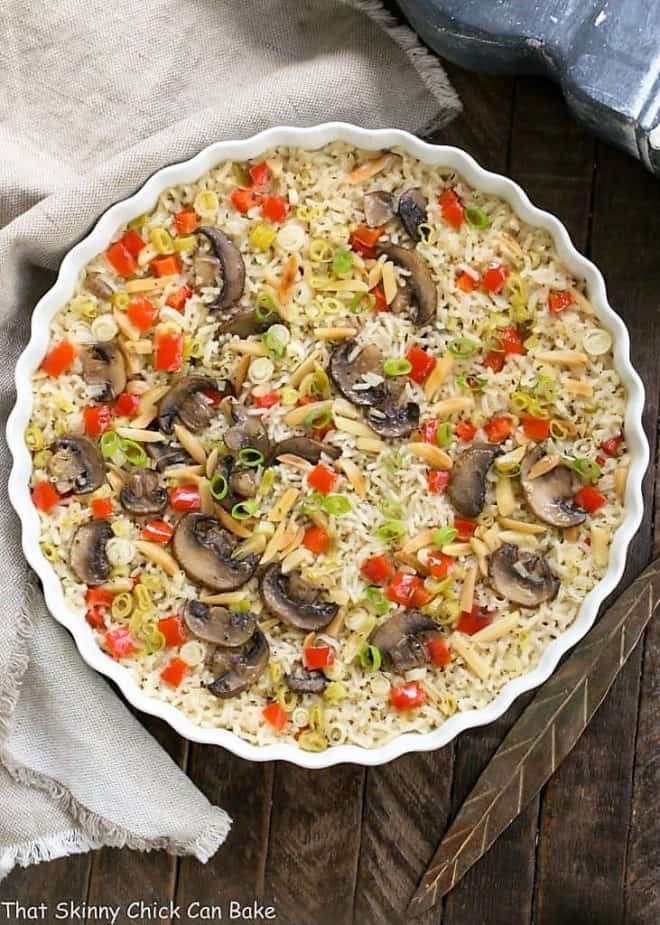 Super easy, scrumptious, oven baked rice! Overhead view of Italian Rice Pilaf in a round casserole