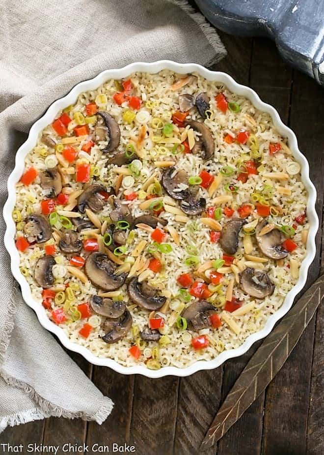 Super easy, scrumptious, oven baked rice! Overhead view of Italian Rice Pilaf in a round casserole.