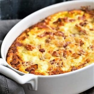 cauliflower casserole in a white baking dish