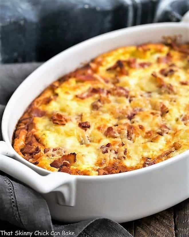 Cauliflower casserole in a white baking dish.