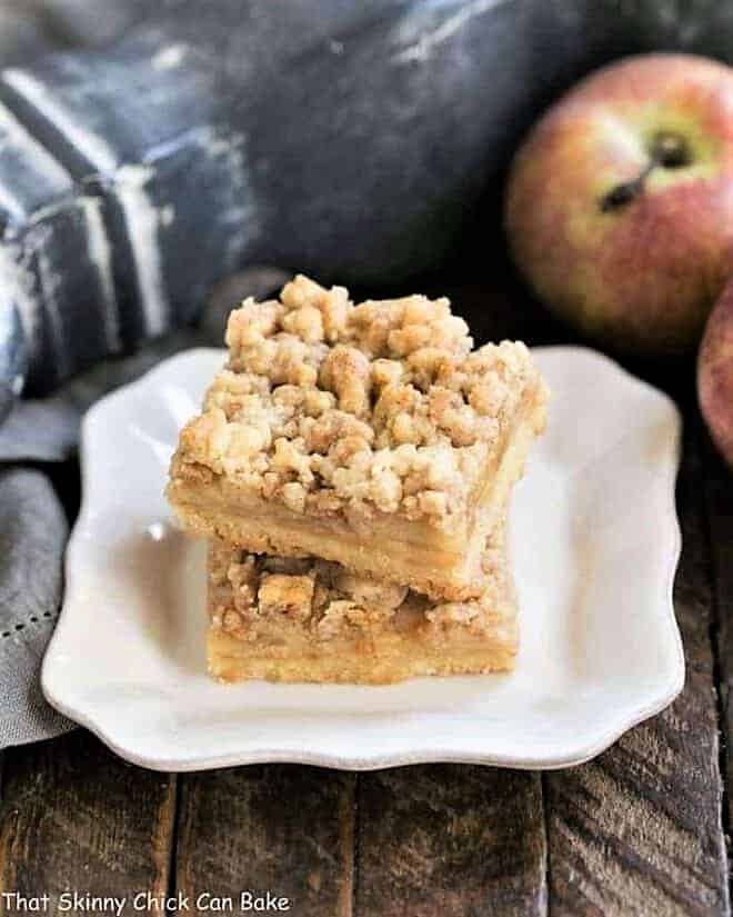 Caramel Apple Pie Toffee Bars stacked on a white plate