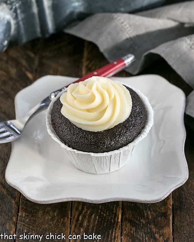 A black bottom cupcake on a square white plate