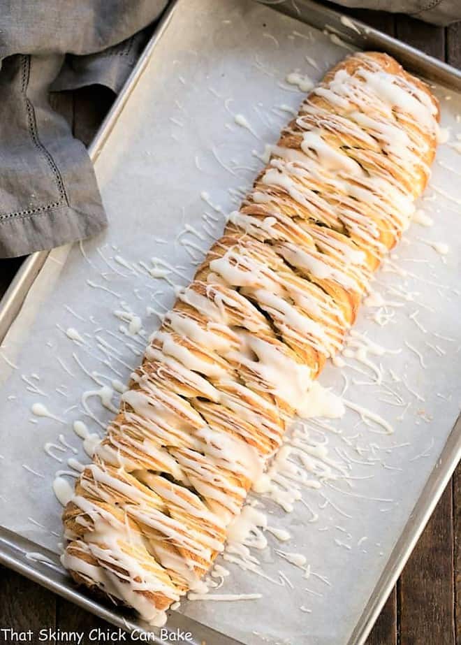 Braided Cinnamon Danish with Laminated Dough on a parchment lined baking sheet.