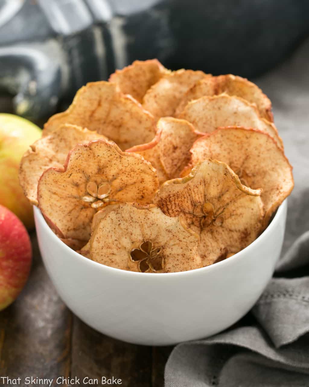 Cinnamon Apple Chips in a white serving bowl.