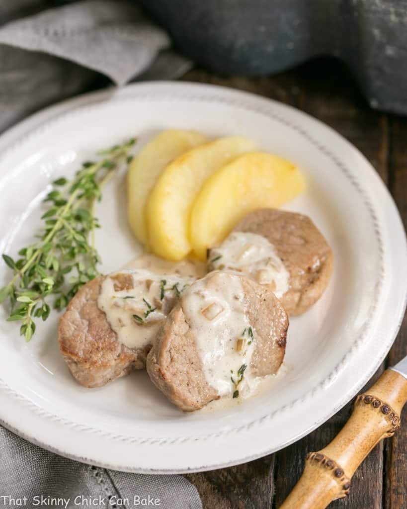 Close view of Apple Topped Pork Medallions with Calvados Cream Sauce
