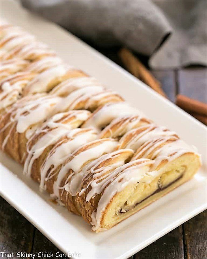 Braided Cinnamon Danish with Laminated Dough on a white tray.