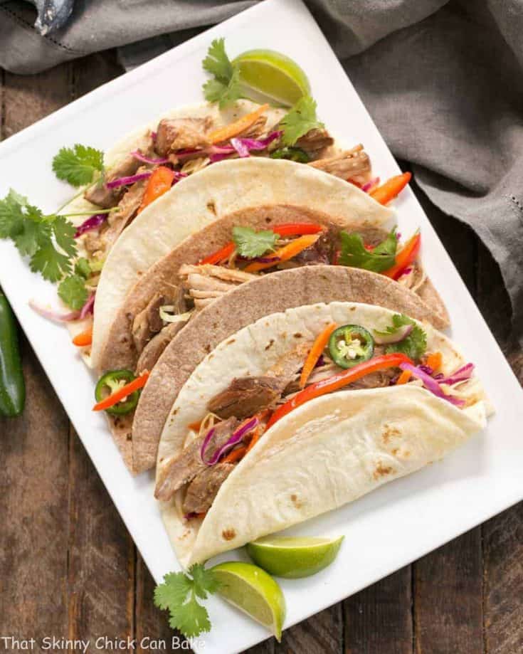 Slow Cooker Asian Pork Tacos with Cabbage Slaw | Shredded pork tacos with an Asian twist!