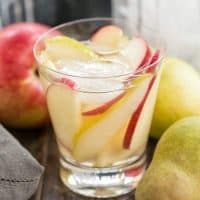Apple Cider Sangria | An autumnal white wine sangria flavored with cider and pear brandy!