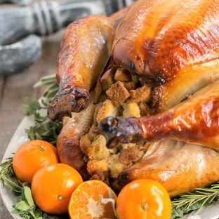   Honey Brined Turkey Recipe on a white serving platter