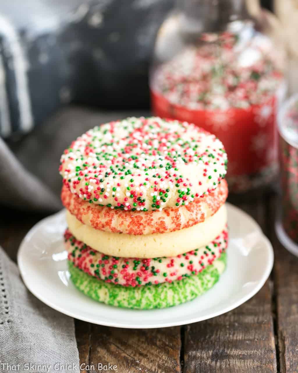 Old-Fashioned Amish Sugar Cookies stacked on a white plate.