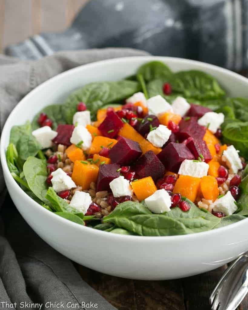 Roasted Fall Vegetable Salad | Roasted beets and butternut squash pair with farro, spinach and goat cheese for a delightful autumnal salad