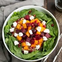Roasted Fall Vegetable Salad | Roasted beets and butternut squash pair with farro, spinach and goat cheese for a delightful autumnal salad