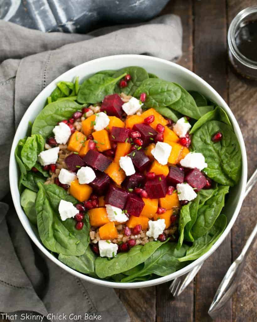 Roasted Fall Vegetable Salad | Roasted beets and butternut squash pair with farro, spinach and goat cheese for a delightful autumnal salad