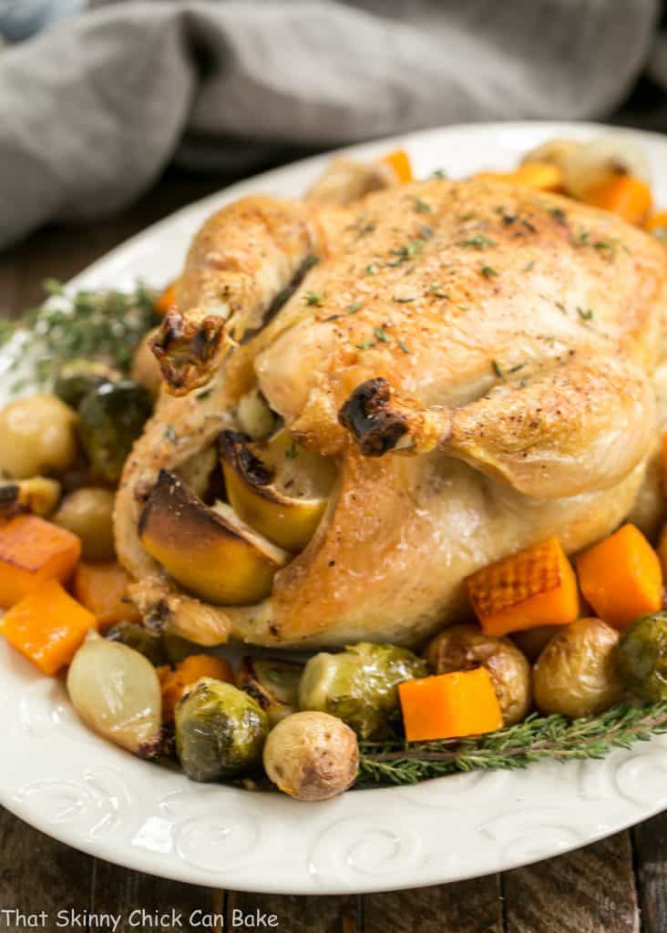 Oven Roasted Chicken with Roasted Fall Vegetables on an oval serving platter