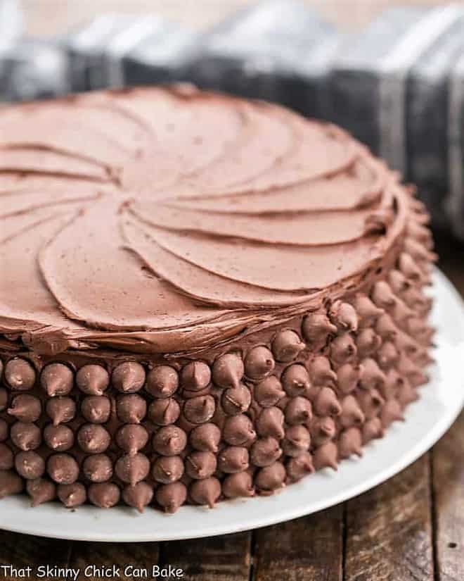 beautifully decorated chocolate cake filled with cheesecake.