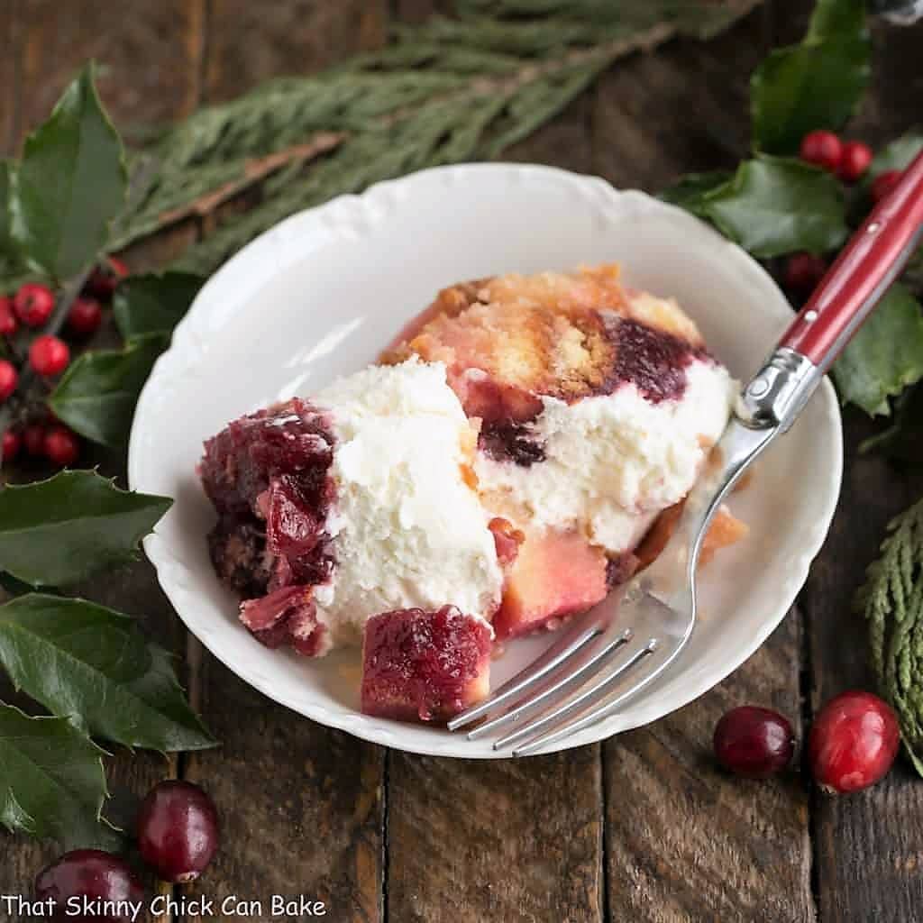 Cranberry Cheesecake Trifle in a white bowl.