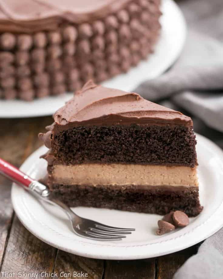 Candy Bar Cheesecake | A sublime combination of a rich chocolate layer cake and milk chocolate cheesecake!
