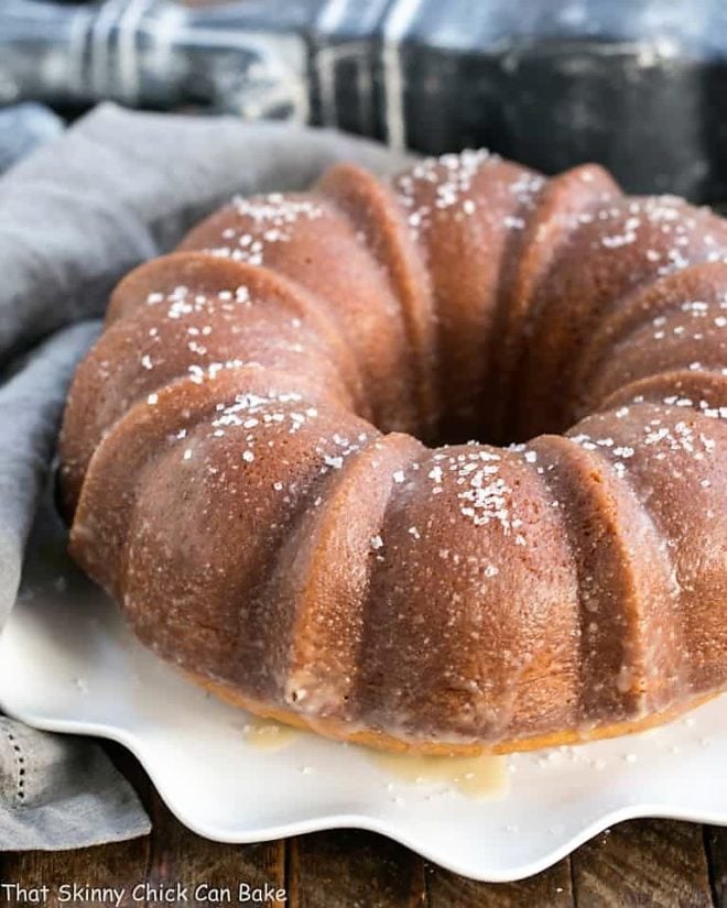 Kentucky Butter Bundt Cake on a wavy edge white cake plate