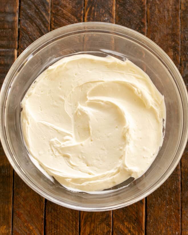 Overhead view of sour cream and cream cheese mixture.