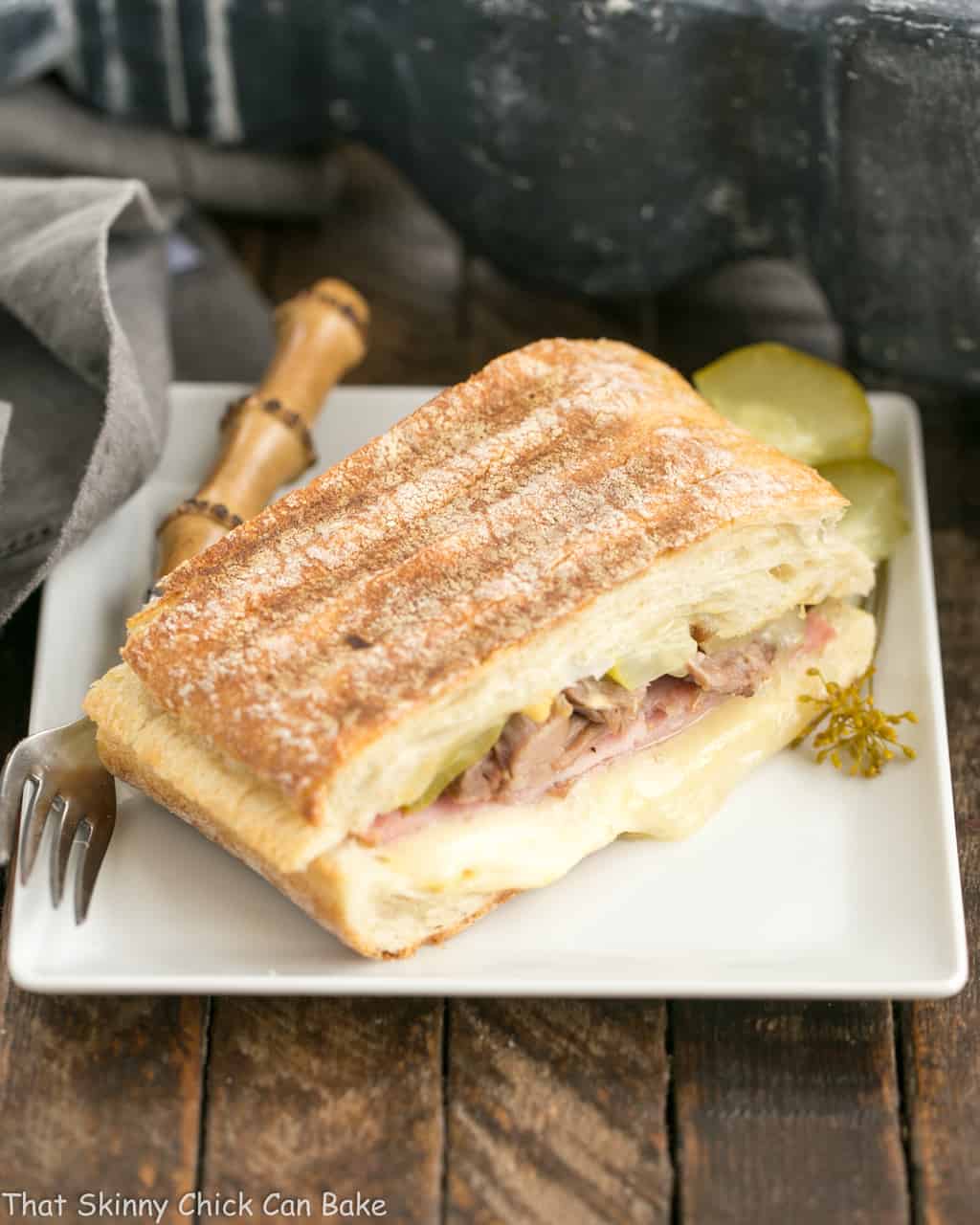 Ciabatta Cubano Sandwich on a square white plate.