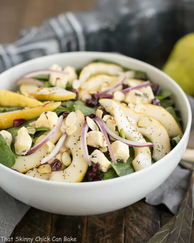 Spinach Pear Salad with Cranberries and Blue Cheese | A terrific autumn or winter salad with an out of this world salad dressing!
