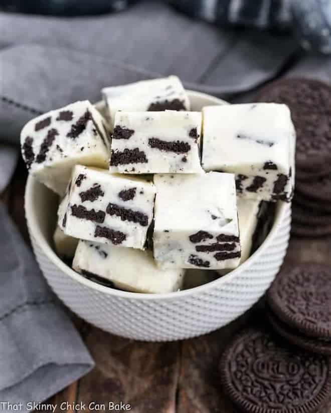 Squares of white chocolate Oreo fudge in a white bowl